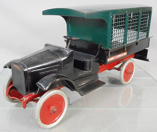 BUDDY L 204A RAILWAY EXPRESS TRUCK: painted pressed steel, 25 in long, side decals replaced, small bend on front chassis, w/orig loco & key, C6-7.