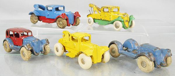 5 KILGORE VEHICLES: painted cast iron, rubber tires, Wrecker, red & blue, 4 1/2 in long, Wrecker, yellow, 3 3/4 in long, Sedan, red & blue, body broken, 3 1/2 in long, Wrecker, yellow, 3 1/2 in long, Chassis, blue, 3 1/2