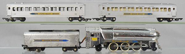 AMERICAN FLYER SILVER BULLET TRAIN SET: S ga, 356 loco, chrome plastic, w/tin tender, 2 #655 silver coaches, 1 has a loose coupler, C5.