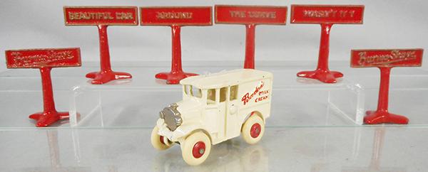 BORDENS & BURMA SHAVE TOYS: painted cast iron, 6 Burma Shave signs, 2 1/2 in tall, Borden's Truck, nickel grille, 3 1/2 in long, these are reproductions, C7-9.