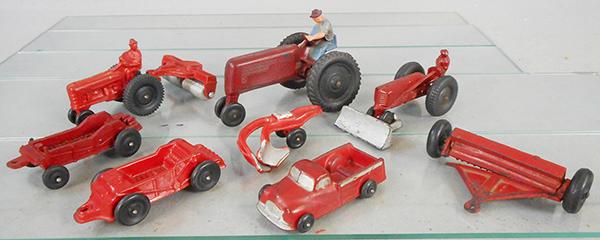 AUBURN RUBBER FARM TOYS: AF02 Tractor, 4 in long, AF05 Tractor, 6 1/2 in long, AF06 Tractor, 4 in long, AT12 Truck, 4 1/2 in long, AI04 Spreader, 4 3/4 in long, AI05 Spreader, 4 3/4 in long, AI10 Cultipacker, 4 1/8 in long, A