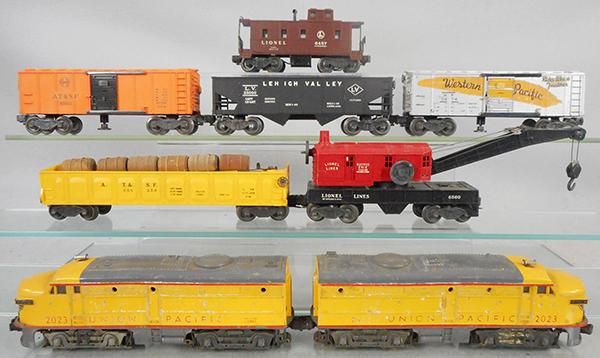 LIONEL TRAIN SET: O ga, 2023 UP Alco AA diesels, power A, tender is missing 1 numberboard, 3562-50 barrel car, missing man, 6560 crane, 3464 ATSF box car, 6456 LV hopper, 3474 WP box car, 6457 caboose, C5-6.
