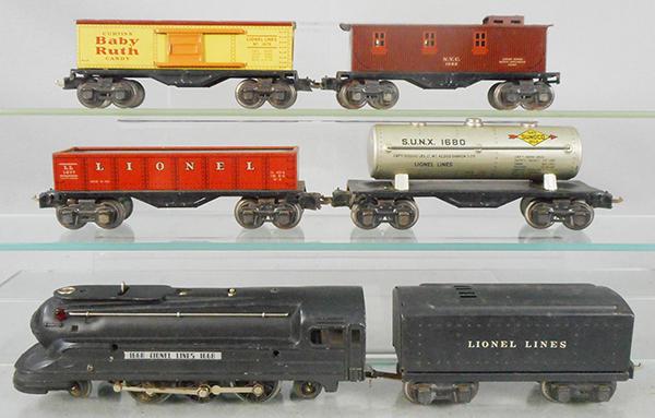 LIONEL TRAIN SET: O ga, 1668 loco, 1689T tender, 1677 gondola, 1680 Sunoco tank, 1679 box car, 1682 caboose, C6.