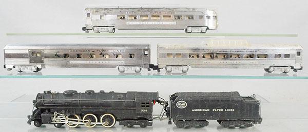 AMERICAN FLYER TRAIN SET: S ga, 326 Hudson loco & tender, w/smoke & choo choo, draw bar screw is broken, 960 Columbus combine, 962 Hamilton, 963 Washington obsv, chrome on cars is worn, C5-6.