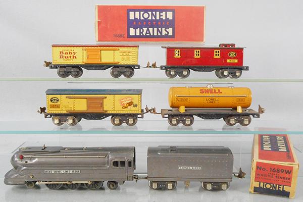LIONEL TRAIN SET: O ga, 1668E loco, 1 front truck wheels fatigued, 1689W tender, 2 #1679 box cars, 1680 Shell tank, 1682 caboose, 2 orig boxes only, boxes rough, C5.