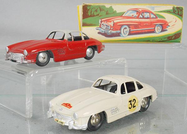 2 QUIRALU MERCEDES 300SL: #8, cream, w/Monte Carlo decals, #9, red & gray, 2 tires flat, w/orig box, both orig issues, C7-8.