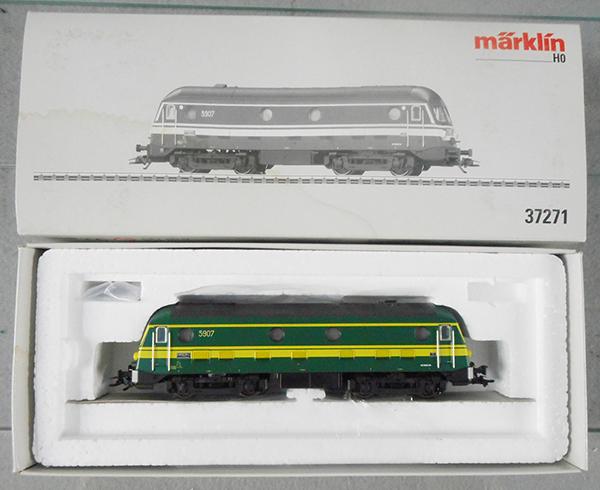MARKLIN 37271 BELGIAN LOCO: HO ga, digital w/sound, orig box & sleeve have water damage which did not affect the loco, orig box & insert minor wear, C8-9.
