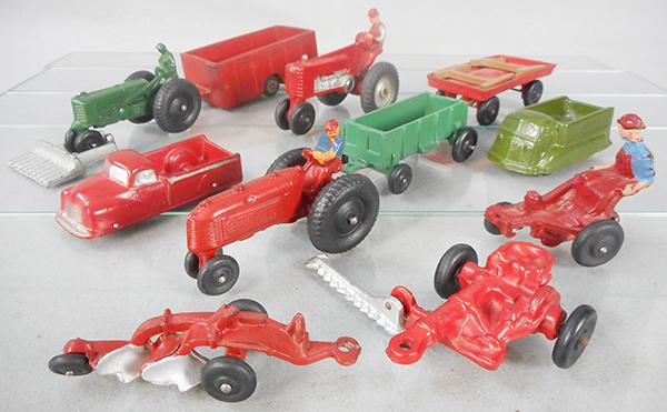 AUBURN RUBBER FARM TOYS: AF01, red, 5 in, AF02, green, 4 in, AF07, red, 4 1/4 in, AI01, red, 5 3/4 in, AI02, green, 4 3/4 in, AI07, red, 3 in, AI08, red, 4 3/4 in, AI13, red, 3 1/2 in, AI14, silver, 2 1/2 in, AI15, red, 5 in,