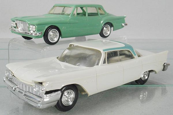 2 CHRYSLER PROMO AUTOS (1 of 2)