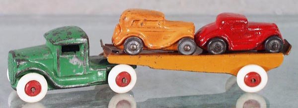 BARCLAY AUTO CARRIER: slush die cast, 5 in long, w/2 1 1/2 in autos, 1 auto repainted, C5-6.