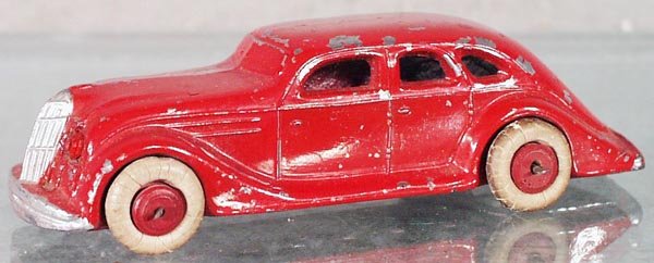 BARCLAY SEDAN: slush die cast, 5 in long, w/jewel headlights, rubber tires worn, C5.