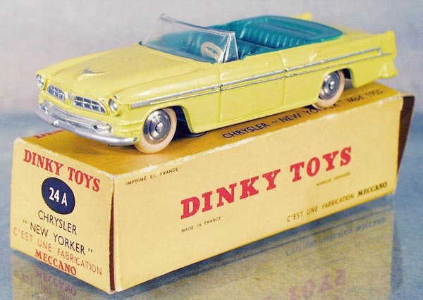 FRENCH DINKY 24A CHRYSLER NEW YORKER: 1955, yellow w/green interior, very minor oxidation on 1 hub, orig box rough, C6-7.