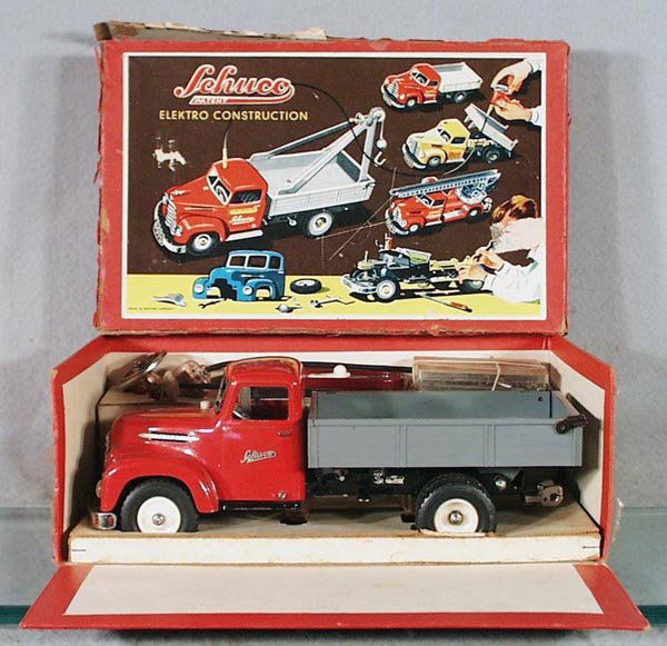 SCHUCO 6065 ELEKTRO CONSTRUCTION DUMP TRUCK: complete w/accessories & instructions, decal chipped on tailgate, orig box & insert minor wear & tape, top worn, C6-7.