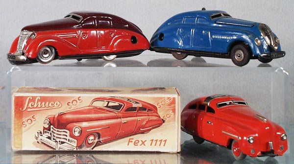 3 SCHUCO AUTOS: 1010 Non-Fall Auto, Germany; 2000 Kommando Auto, Germany; 1111 Fex Auto, US Zone Germany, missing grille, orig box rough, all vehicles are windups working, some playwear, C5-7.