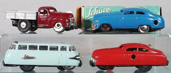 4 SCHUCO VEHICLES: 3042 Lasto Truck, 3041 Limo, 3044 Bus, 1001 Mirako Car, w/incom orig box, all are windups working, C5-6.