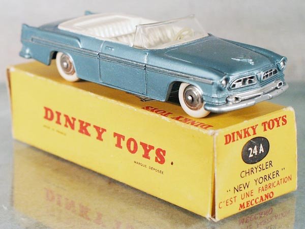 FRENCH DINKY 24A CHRYSLER NEW YORKER: metallic blue w/ivory interior, oxidation on base & 2 hubs, orig box minor wear, C7.