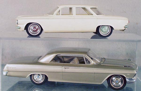 2 AMT CHEVROLET PROMO AUTOS: 1961 Corvair 700 4-door Sedan, beige, 7 in long, w/chrome worn on bumpers & hub caps; 1962 Impala, silver, w/opening hood, 8 in long, C6.