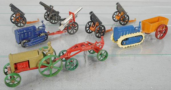 TOOTSIETOY ARMY & FARM TOYS: 3 #4662 Mortars, 2 #4642 Cannons, 2 #4646 Caterpiller Tractors w/eyelet hitches intact, Huber Trailer & Scraper, 4654 Tractor w/intact eyelet hitch, C6-8.
