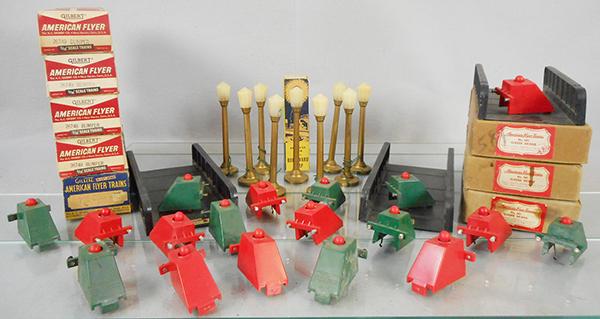 AMERICAN FLYER ACCESSORIES: S ga, 18 bumpers, w/4 26749 boxes, 730 box, 3 #581 girder bridges w/orig box & insert, 9 #749 lamps, 1 orig box worn, C5-8.