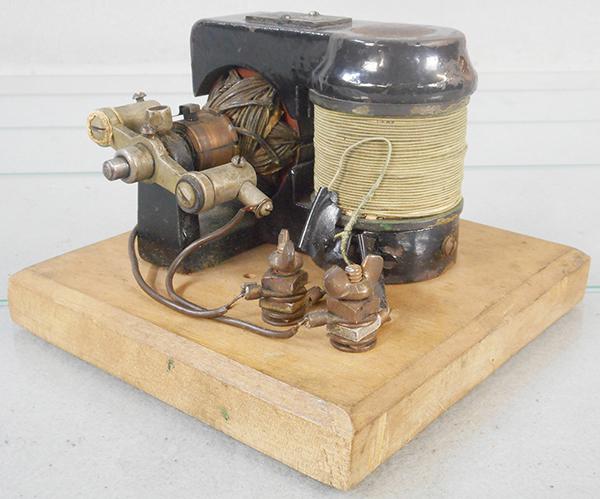 VOLTAMP ELECTRIC MOTOR: 6 1/2 in wide, mounted on wood base, C7-8.