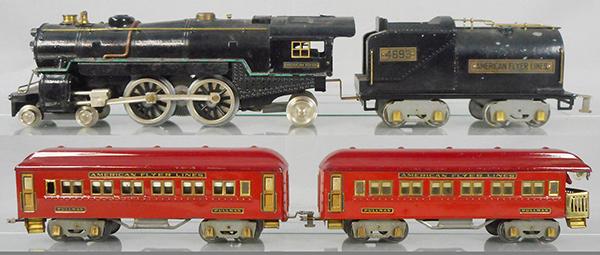 AMERICAN FLYER TRAIN SET: std ga, 4675 die cast loco, rewheeled, some paint peeling on top of loco cab, 4693 tender, 4331 Pullman, 4332 obsv, cars are 2-tone red, w/decal doors & plates, orig car boxes only, C6-7.