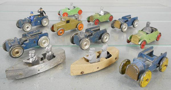 11 TOOTSIETOY FUNNIES VEHICLES: 5 #5104 Moon Mullins Patrols, 3 #5102 Uncle Walt's car, 2 #5106 Uncle Willie's Boat, all are incom, most figures are recast, C2-5.
