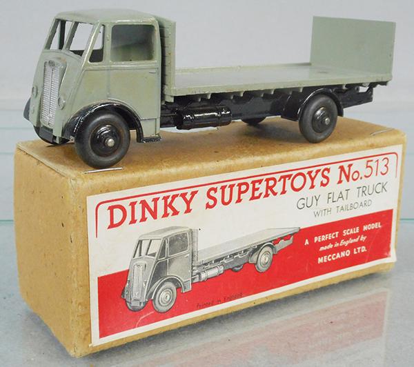 DINKY 513 GUY FLAT W/TAILBOARD: gray & black, edge wear on fenders, orig box minor wear, C8.
