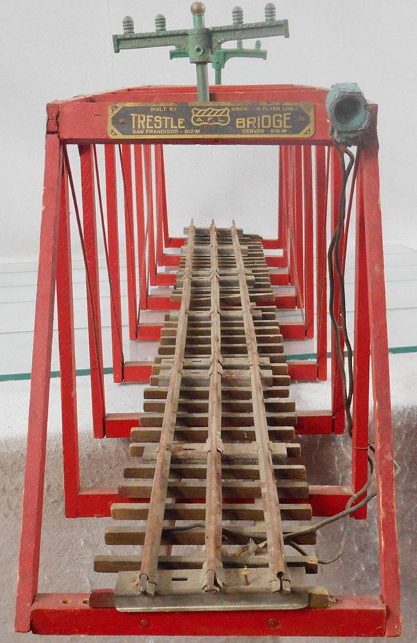 AMERICAN FLYER 4220 TRESTLE BRIDGE: std ga, wood, w/worn die cast trim, 1 telegraph pole repaired, C5.
