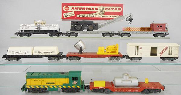 AMERICAN FLYER TRAIN SET: S ga, 21801 CNW Baldwin switcher, w/screw crack, 24533 service car, missing 1 brakewheel, w/orig box, 24575 Bordens milk, 24549 searchlight, 24057 Mounds box car, 24330 Bakers Chocolate tank, 24561 cr