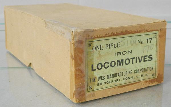 IVES 17 ORIG LOCOMOTIVE BOX: O ga, cardboard, 8 3/4 by 2 5/8 in, 1 piece of tap on front, 2 words of pencil graffiti on label, box is empty, C8.