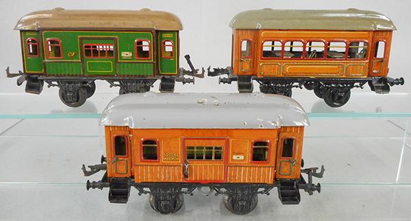 3 BING PASSENGER COACHES: 1 ga, handpainted & litho tin, 10363 post/baggage car, no opening doors, 13536 spiesewagen w/interior, brown, 13537 post/baggage car w/opening doors, brown, C6-7.