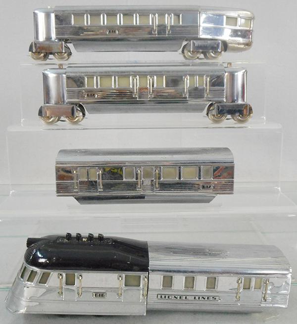 LIONEL 100 STREAMLINER TRAIN SET: O ga, 616W Flying Yankee loco, chrome, black top, corrosion spots on black loco top, 2 #617 coaches, 618 obsv, orig boxes, orig set box worn & missing 1 top flap, C7-8.