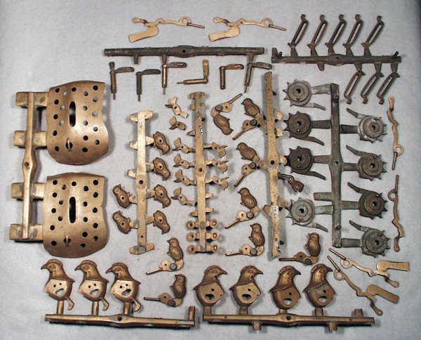 J&E STEVENS HEN & CHICK BANK BRONZE PATTERN PARTS: 75 pieces, some still attached to trees, Excellent.