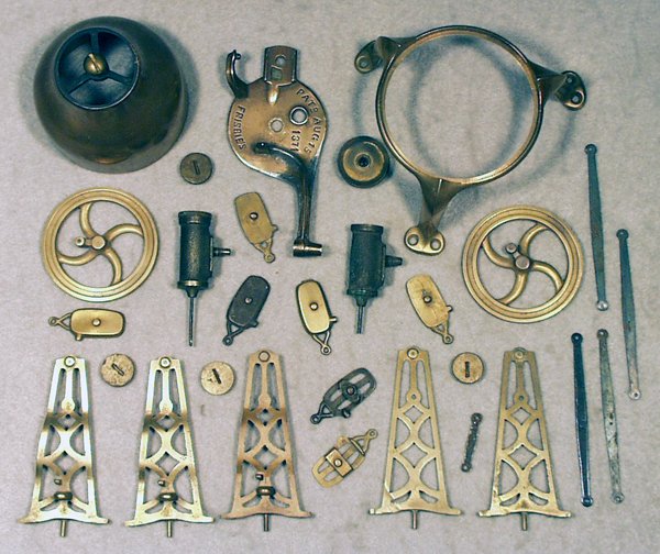 J&E STEVENS FRISBEE'S STEAM ENGINE: 24 bronze pattern parts, enough to assemble the toy, Excellent.