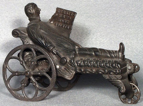 J&E STEVENS BABY QUIETER BELL TOY: loosely assembled form unpainted cast iron parts, missing leg, Good.