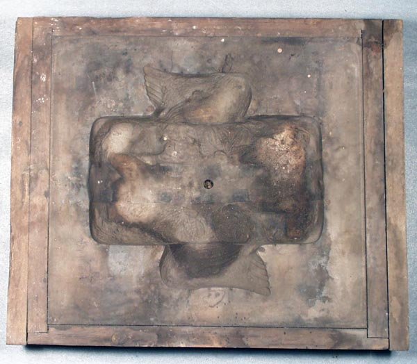 J&E STEVENS HEN & CHICK SAND MOLD: wood frme, 14 in by 17 in, Chicken written in chalk on the side of the frame, sand hardened & stained, Fair.