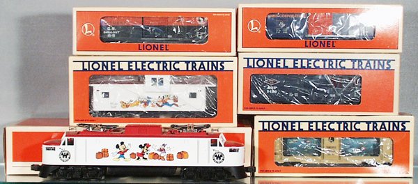 024: LIONEL TRAIN SET: O ga, 18311 Disney loco w/cars 29200 box car, 6454 box car, 16681 aquarium car, 9480 box car, 19723 Disney caboose, orig boxes, C9.