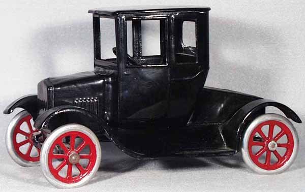 099: BUDDY L FLIVVER COUPE: painted pressed steel, 10 3/4 in long, restored, C8.