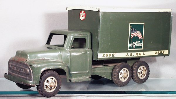 BUDDY L US MAIL TRUCK: painted pressed steel, black rubber tires, 21 in long, decals minor wear, 1 side decal has 2 large chips, back doors complete, some scraping from handle, cab front has some wear & paint loss, C5.