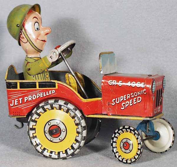 UNIQUE ART GI JOE & HIS JOUNCING JEEP: lithographed tin, windup working, 7 in long, C6-7.