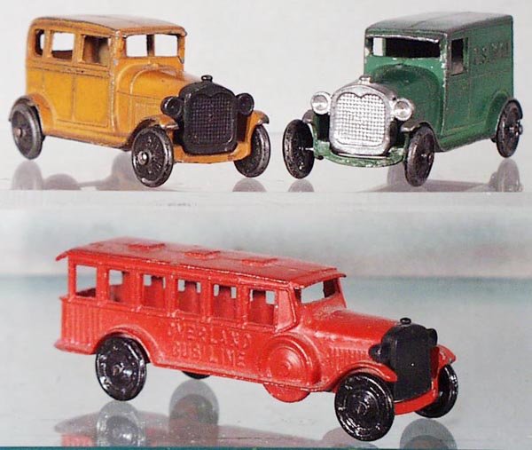 3 TOOTSIETOY VEHICLES: 6665 Model A Sedan, Model A US Mail Truck, 4680 Overland Bus, C5-7.