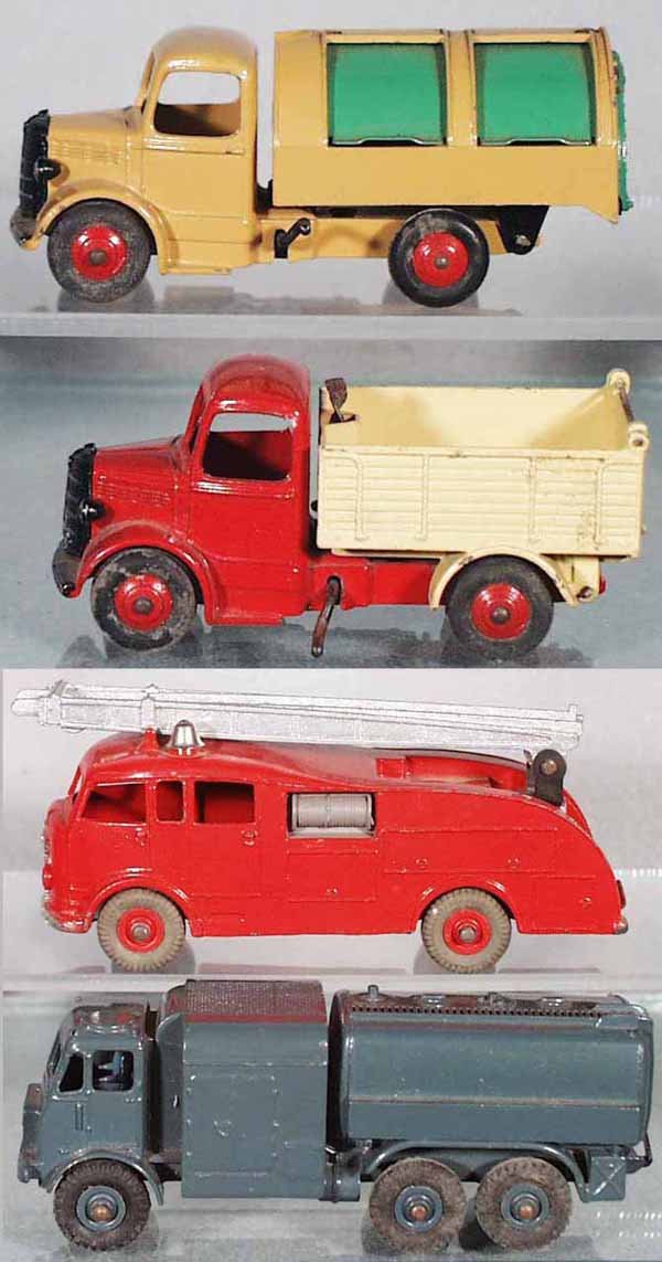 4 DINKY VEHICLES: 252 Bedford Refuse Wagon, 410 Bedford Tipper, 555 Fire Engine, 642 Pressure Refueller, mildew on tires, C5-7.