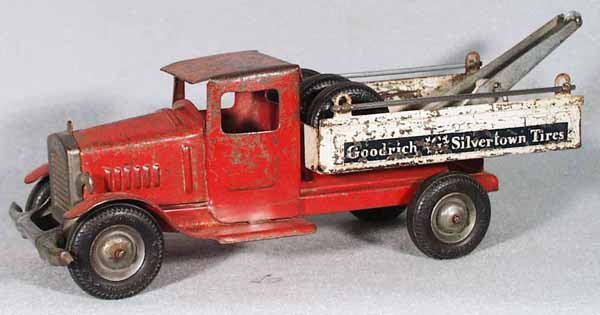 METALCRAFT GOODRICH TOW TRUCK: painted pressed steel, black rubber tires, 11 1/2 in long, heavy playwear, missing hook, C3-4.