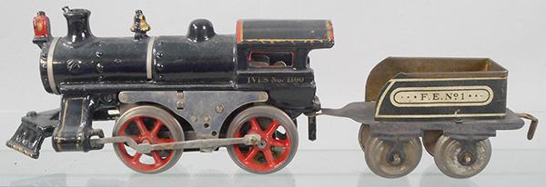 IVES 1100 LOCO & TENDER: O ga, painted cast iron, electric loco w/rubberstamped number board, FE1 tender, 1 axle replaced, some bends on sides, loco C8, tender C6.