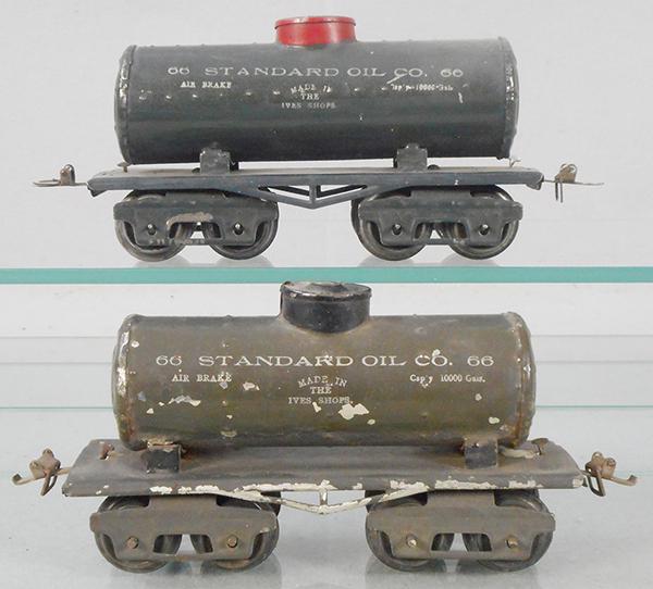 2 IVES 66 TANK CARS: O ga, gray, different versions w/horizontal & vertical rivet patterns, some paint flaking, ca 1913, C5-6.