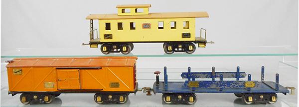 3 AMERICAN FLYER FREIGHT CARS: std ga, 4011 6-window caboose, yellow, 4008 box car, 2-tone orange w/red ladder & brakewheels, 2 holes in floor, 4012 flat car, blue, paint flaking, w/red brakewheel, C5-7.