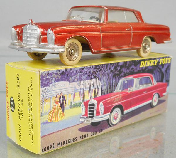 FRENCH DINKY 533 MERCEDES 300SE: orange, oxidation spots on hubs, white tires worn, orig box minor wear, C7-8.