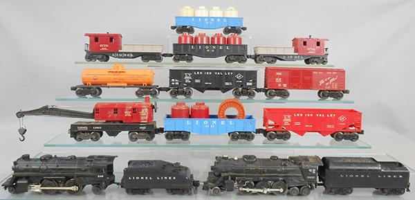 2 LIONEL TRAIN SETS: O ga, 2037 loco, 1130T tender, 246 loco, 1062T tender, 6560 crane, 6042 gondola, 6476 hopper, 6025 tank, 6076 hopper, 6014 box car, 6112 gondola, 6042 gondola, graffiti on canisters, 2 #6119 cabooses,