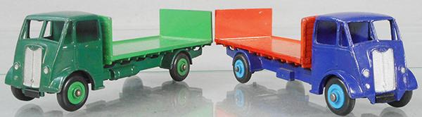 2 DINKY 513 GUY TRUCKS: Guy Trucks w/tailboard, 1 is 2-tone green, other is blue & orange w/touch up spots on tailboard, C6.