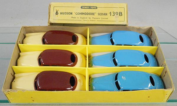 DINKY 139B HUDSON TRADE BOX: 3 are beige & maroon, 3 are gray & blue, orig box minor wear, w/graffiti, dividers are reproductions, C6-8.